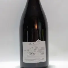 Bouteille de vin du domaine Méo-Camuzet, avec une étiquette détaillée présentant une carte des grands terroirs.
