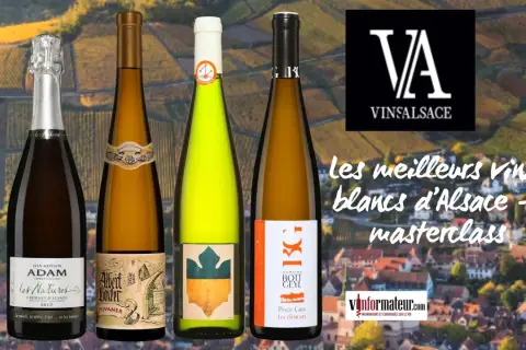 Quatre bouteilles de vin d'Alsace, dont un Albert Boxler Sylvaner, sur fond de vignobles.